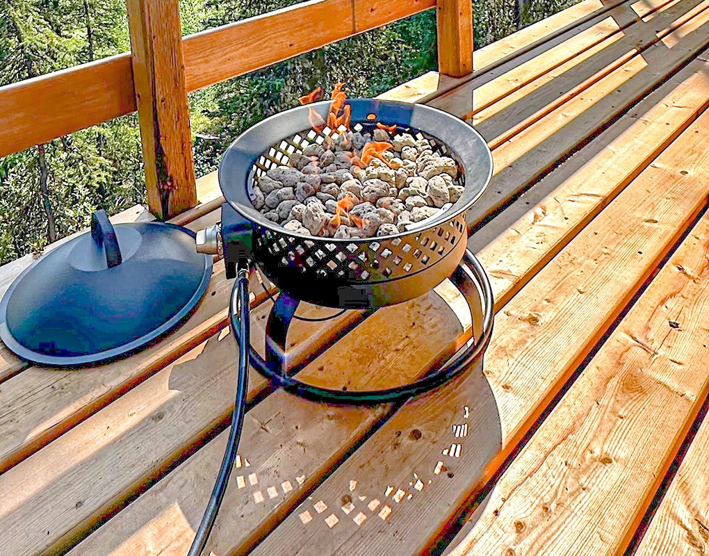 a fire pit on a deck