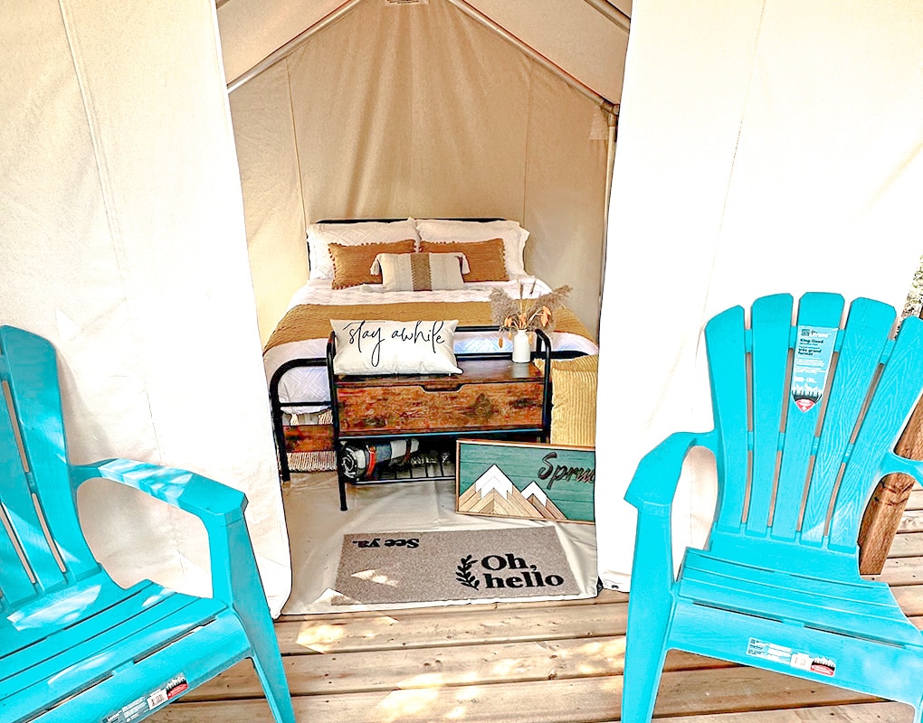 a blue chairs in a tent