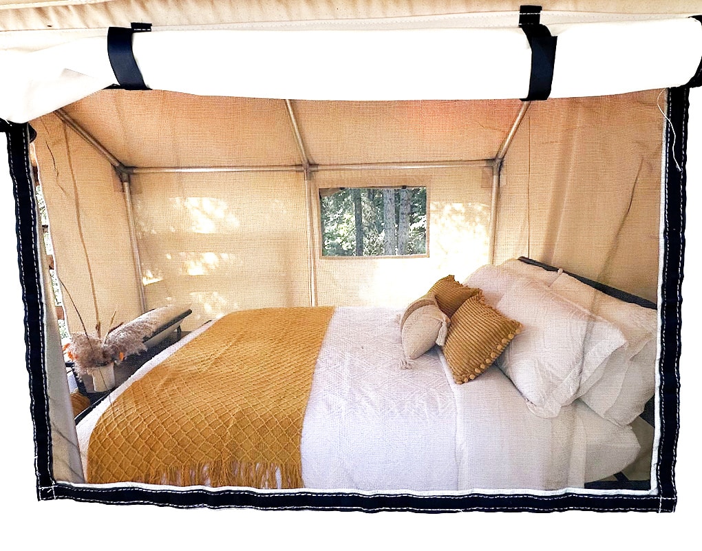 a bed with a canopy over it