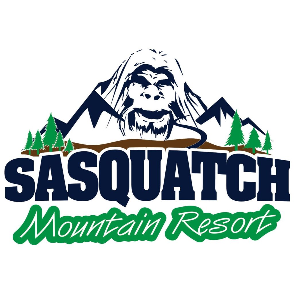 a logo with a gorilla and mountains